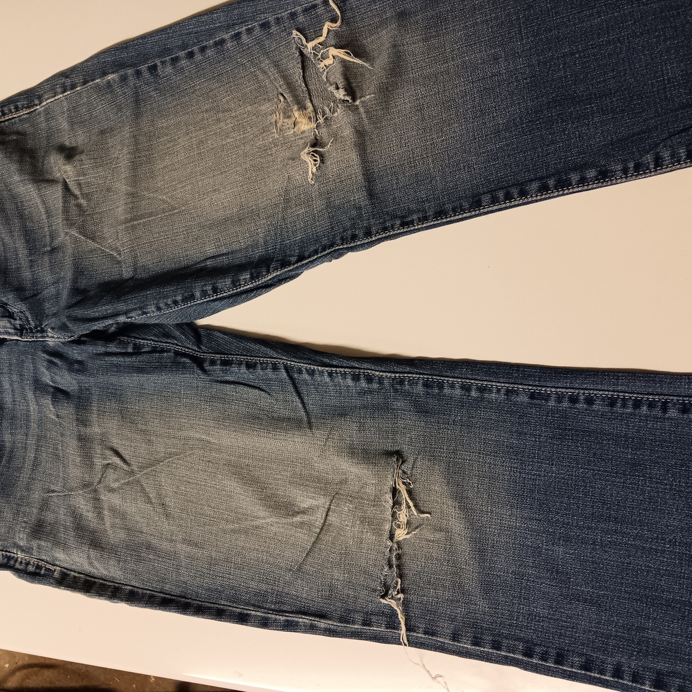 Distressed Blue Jeans